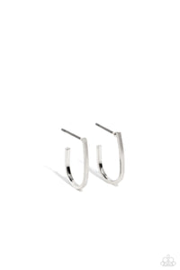 A skinny bar of silver drops from the ear, creating a dainty, elongated hoop in the shape of a "J". Earring attaches to a standard post fitting. Hoop measures approximately 3/8" in diameter. 