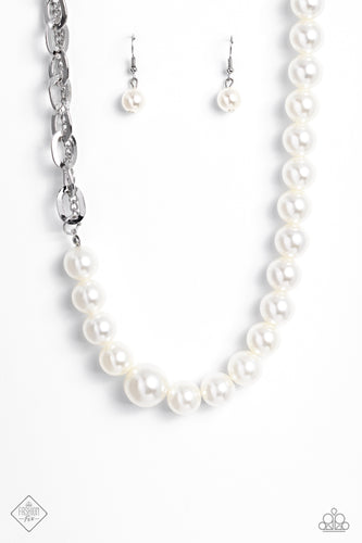 A strand of white pearls collides with layers of chains to create an abstract blend of grit and glitz. The oversized links of the curb chain offset the pearly sheen of the beads that lay on the opposite side, perfectly balancing the contrasting design. Features an adjustable clasp closure.  Sold as one individual necklace. Includes one pair of matching earrings.  New Kit Fashion Fix