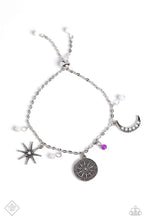 Load image into Gallery viewer, Dainty white stones and an amethyst bead swing from a dainty silver chain, alternating with three wanderlust-inspired charms. The charms include a three-dimensional, studded silver star and a crescent moon, each dotted with opalescent rhinestones, along with an antiqued silver disc embossed with compass details. Features an adjustable sliding closure. As the stone elements in this piece are natural, some color variation is normal.  Sold as one individual bracelet.
