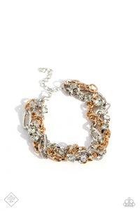 Mismatched strands of glistening gold and silver oval links are intertwined with a row of sparkling, square-cut, white rhinestones encased in sleek silver fittings, resulting in a twisted collision of grit and glamour around the wrist. Features an adjustable clasp closure.  Sold as one individual bracelet.