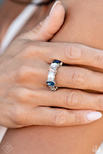 Load image into Gallery viewer, Held in place by thick, silver, pronged fittings, various glassy peach, white, and blue gems, and a glossy white pearl fall in line along a dainty silver bar atop the finger for a refined statement. Features a dainty stretchy band for a flexible fit.  Sold as one individual ring.
