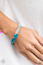 Load image into Gallery viewer, Four dainty rows of white rhinestones are encrusted across one side of a silver cuff-like bangle for a timeless fashion. Featuring a silver heart motif, the other side of the silver cuff is painted in a vibrant shade of turquoise for a carefree finish. Features a hinged closure.
