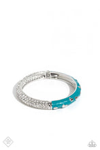 Load image into Gallery viewer, Four dainty rows of white rhinestones are encrusted across one side of a silver cuff-like bangle for a timeless fashion. Featuring a silver heart motif, the other side of the silver cuff is painted in a vibrant shade of turquoise for a carefree finish. Features a hinged closure.
