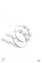 Load image into Gallery viewer, A trio of white flowers, featuring an iridescent sheen and dotted with white pronged rhinestone centers, blossoms atop a thin silver hoop for a dreamy, whimsical finish. Earring attaches to a standard post fitting. Hoop measures approximately 2 1/2&quot; in diameter. Due to its prismatic palette, color may vary.  Sold as one pair of hoop earrings.
