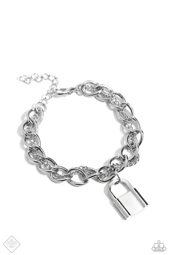 A strand of rounded silver curb chain is infused with a strand of classic silver chain that twists and curves around and through its high-sheen links. A silver lock charm dangles from the mismatched chains for an edgy finish. Features an adjustable clasp closure.  Sold as one individual bracelet.  New Kit Fashion Fix