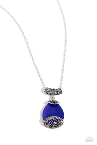  Infused with an elegantly elongated silver chain, a dramatic blue cat's eye teardrop, framed in a studded filigree frame, swings from the bottom of an iridescent and multicolored rhinestone-encrusted silver fitting, creating a hypnotic pendant. Features an adjustable clasp closure. Due to its prismatic palette, color may vary. 