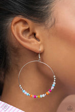 Load image into Gallery viewer, Featuring a flashy faceted finish, glittery multicolored beads, multicolored seed beads, clear beads, and silver accents glide along a silver wire hoop, creating a free-moving colorful design. Earring attaches to a standard fishhook fitting.  Sold as one pair of earrings.
