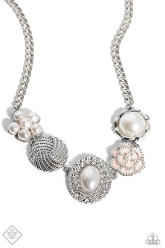 A refined display of shimmery pearl charms and floral-inspired accents gather below the collar creating a cultivated display. The hodgepodge of texture and sheen includes pearl-adorned flowers in various shapes, borders of white rhinestones around an oval pearl center, and tactile silver studs emanating in a twisted pattern. Features an adjustable clasp closure.  Sold as one individual necklace. Includes one pair of matching earrings.  New Kit Fashion Fix