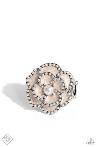 Layers of Tender Peach pearl-painted, heart-shaped petals curve around a white pearl center, creating an airy three-dimensional flower. Dainty white pearls dot along each curved petal adding refinement to the whimsical centerpiece atop the finger. Features a stretchy band for a flexible fit.  Sold as one individual ring.  New Kit Fashion Fix