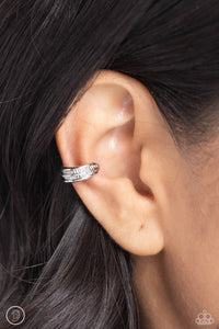 Featuring a layered effect, sleek and studded silver bars stack around the ear for a dynamic statement. Features a smooth surface for sliding ability to desired position on the ear. Due to its structure, adjusting capability is limited.