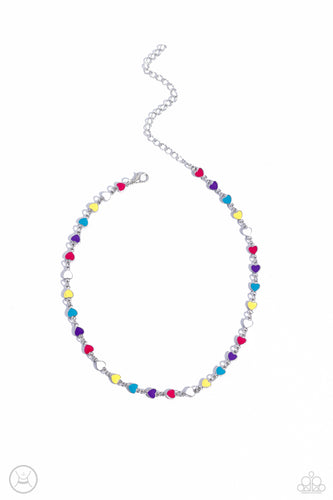 Multicolored-painted silver hearts interconnect around the collar for a simply sentimental look. Features an adjustable clasp closure.