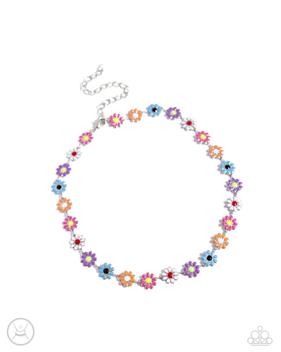 Featuring apple green, yellow, red, black, and white-painted centers, a collection of hot pink, white, purple, turquoise, and orange-painted silver daisies encircle the collar for a summer-inspired statement. Features an adjustable clasp closure. 