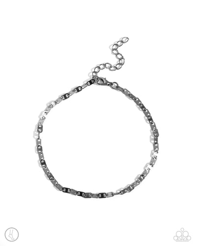 Resembling soda can tabs, an abstract gunmetal chain links around the ankle for a simply, streamlined statement. Features an adjustable clasp closure.