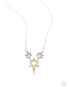 Dotted with various yellow and yellow iridescent highly reflective rhinestones, a stellar collection of silver stars of varying sizes connects and extends from a dainty silver link chain for an out-of-this-world fashion. Features an adjustable clasp closure. Due to its prismatic palette, color may vary