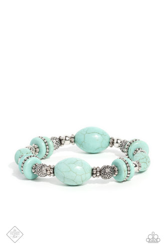 Infused along an elastic stretchy band, an Egyptian-esque collection of muted turquoise stones in various sizes, striped silver beads, textured silver beads, floral silver wheel beads, and silver accents wrap around the wrist for a refreshing finish. As the stone elements in this piece are natural, some color variation is normal.  Sold as one individual bracelet.  New Kit Fashion Fix