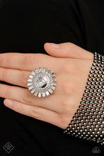 Load image into Gallery viewer, Radiating from an ornate, rhinestone-dusted center, dainty rhinestones and emerald-cut white gem bars gleam and shimmer atop the finger. Featured in the center of the dazzling halo, a diamond-shaped gem directs the eye in a compass-like manner for additional shimmer and standout sheen. Features a stretchy band for a flexible fit.  Sold as one individual ring.  New Kit Fashion Fix
