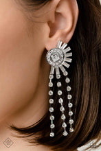 Load image into Gallery viewer, Encased in square silver fittings, three strands of dainty, glistening, white gems cascade from a blindingly ornate circular frame. Emerald-cut white gems explode from the rhinestone-dusted frame for additional eye-catching light and sheen. Earring attaches to a standard post fitting.  Sold as one pair of post earrings.  New Kit Fashion Fix
