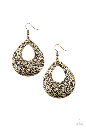 Antiqued floral filigree is embossed across the front of an oversized brass teardrop, creating a whimsical frame. Earring attaches to a standard fishhook fitting.  Sold as one pair of earrings.