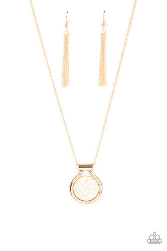 Encased in an artisan inspired gold fitting, a refreshing white stone pendant glides along a gold chain for a colorfully seasonal look. Features an adjustable clasp closure.