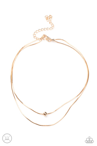 Infused with a single gold bead, two dainty rows of rounded snake chain layer around the neck for a seamlessly chic look. Features an adjustable clasp closure.  Sold as one individual choker necklace. Includes one pair of matching earrings.  New Kit Choker