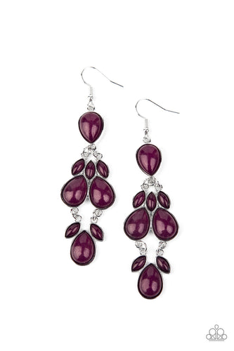 Encased in sleek silver fittings, a glassy collection of marquise and teardrop Magenta Purple beads delicately connect into a dramatically colorful lure. Earring attaches to a standard fishhook fitting.