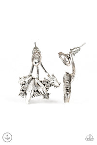 A solitaire white marquise cut rhinestone attaches to a double-sided post, designed to fasten behind the ear. Encrusted in a collision of mismatched white rhinestones, a double-sided post peeks out beneath the ear, creating a glittery fringe. Earring attaches to a standard post fitting.  Sold as one pair of double-sided post earrings.  New Kit Ear Jacket