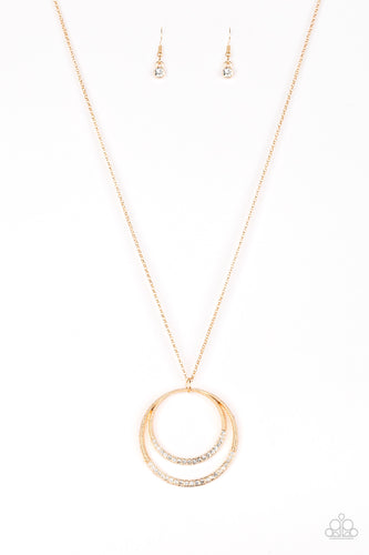 A daring circular pendant swings from the bottom of an elongated gold chain for a refined look. The bottoms of the ornate gold pendant are encrusted in white rhinestones for a glamorous finish. Features an adjustable clasp closure.