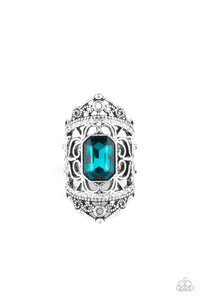 Infused with two bands of glittery white rhinestones, smooth and studded silver filigree branches out into a regal backdrop across the finger. Featuring an emerald style cut, a glittery blue rhinestone embellishes the center for a royal finish. Features a stretchy band for a flexible fit.