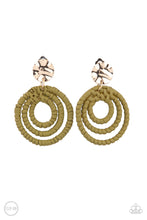 Load image into Gallery viewer, A hammered gold disc attaches to rippling hoops wrapped in green wicker-like cording, creating an earthy lure. Earring attaches to a standard clip-on fitting.  Sold as one pair of clip-on earrings.  New Kit Clip On Earring
