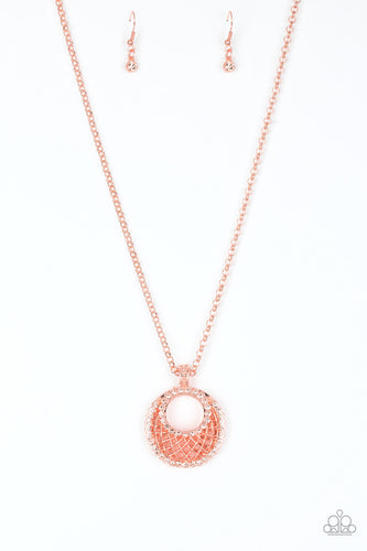 Featuring a shiny copper net-like pattern, a peach rhinestone encrusted crescent shaped frame swings from the bottom of a lengthened shiny copper chain, creating a refined 3-dimensional pendant. Features an adjustable clasp closure.