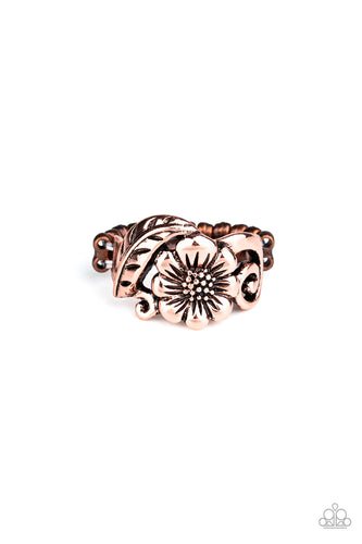 Brushed in an antiqued shimmer, a leafy copper frame and blooming floral centerpiece delicately join into a whimsical band around the finger. Features a dainty stretchy band for a flexible fit.