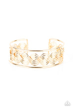 Load image into Gallery viewer, Flattened in sections, rows of glistening gold wire weave between two gold bars, creating a shimmery cuff around the wrist.
