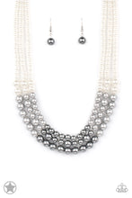 Load image into Gallery viewer, Strands of white, silver, and dark gray pearls elegantly drape below the collar, creating a beautiful ombre effect. Sectioned by silver accents, the luminescent pearls radiantly fall into a glamorous cascade. Features an adjustable clasp closure.
