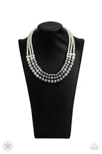 Load image into Gallery viewer, Strands of white, silver, and dark gray pearls elegantly drape below the collar, creating a beautiful ombre effect. Sectioned by silver accents, the luminescent pearls radiantly fall into a glamorous cascade. Features an adjustable clasp closure.
