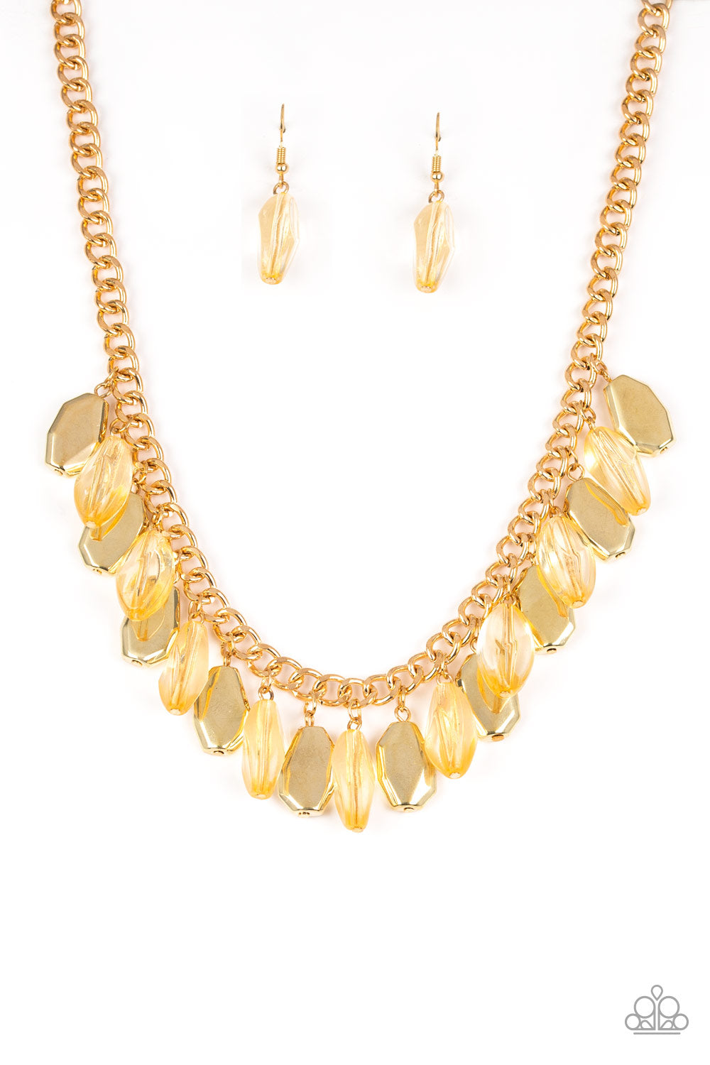 Faceted golden beads and imperfect gold teardrops drip from the bottom of a shimmery gold chain, creating a sassy fringe below the collar. Features an adjustable clasp closure.