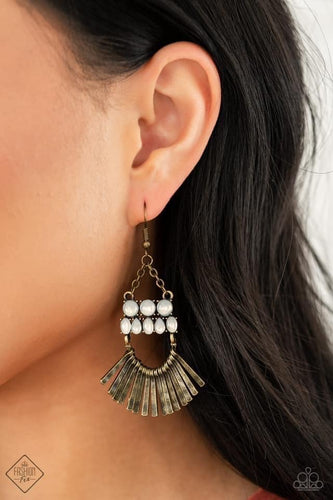 A row of delicately hammered brass rods fans out along a dainty brass wire that attaches to the bottom of stacked rows of opalescent white beads. The mismatched rows of dewy beads swing from the bottom of dainty brass chains, coalescing into an ethereally rustic chandelier. Earring attaches to a standard fishhook fitting.