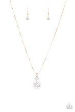 Load image into Gallery viewer, Nestled inside classic gold prongs, two oversized white rhinestones slide along a dainty gold snake chain, creating a dramatic pendant below the collar. Features an adjustable clasp closure.
