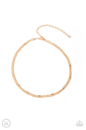 A dainty gold beaded chain joins two rows of plain gold chain around the neck, creating shimmery layers. Features an adjustable clasp closure.  Sold as one individual choker necklace. Includes one pair of matching earrings.  New Kit Choker