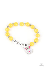 Load image into Gallery viewer, Infused with a dainty rabbit charm and beads that spell out, &quot;Hop,&quot; across the wrist, the stretchy bracelets feature polished beads that vary in shades of blue, pink, purple, yellow, and green
