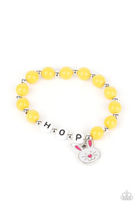 Infused with a dainty rabbit charm and beads that spell out, "Hop," across the wrist, the stretchy bracelets feature polished beads that vary in shades of blue, pink, purple, yellow, and green