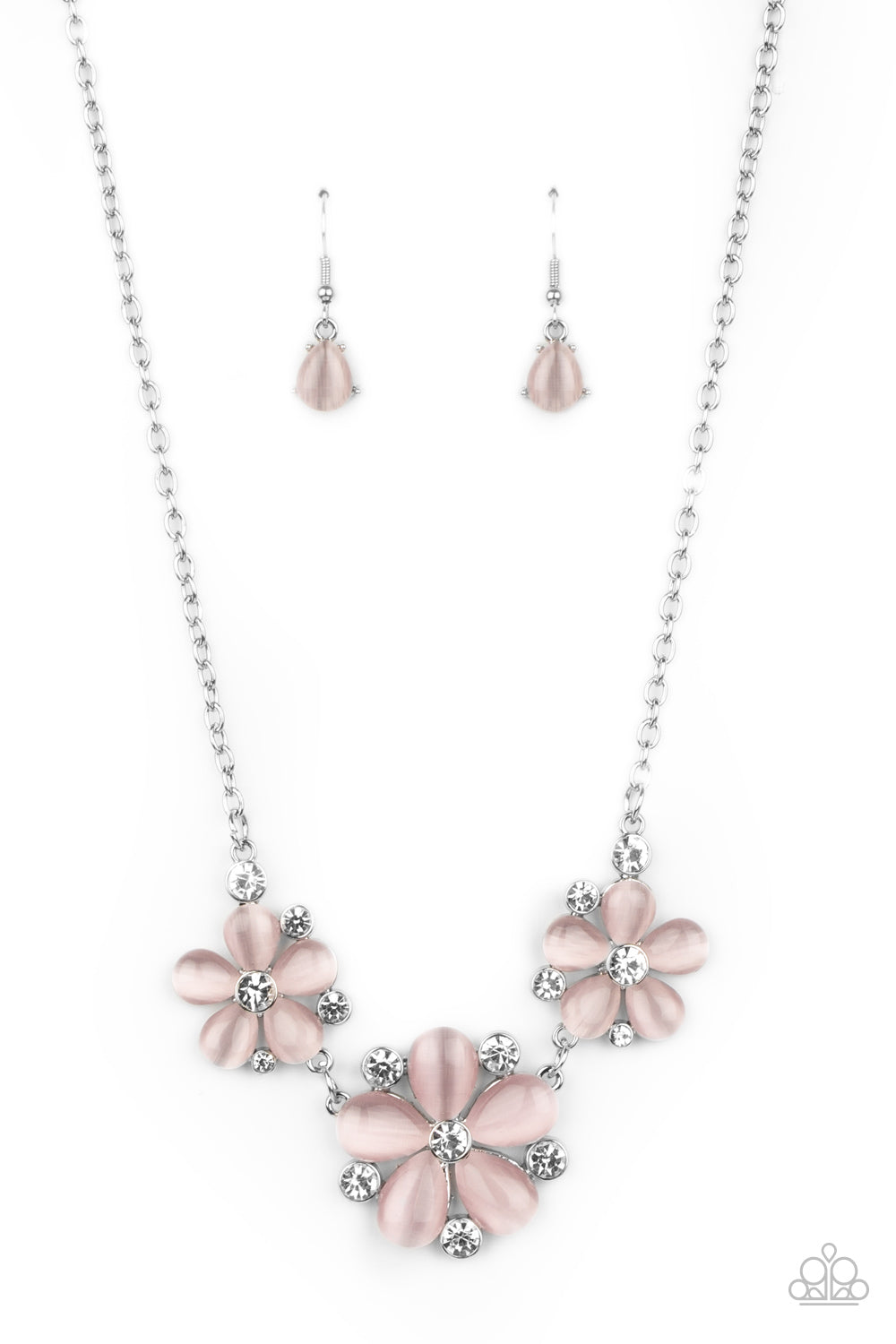Dotted with glassy white rhinestone centers, a trio of pink cat's eye stone petaled flowers blossom below the collar for an enchanted look. Features an adjustable clasp closure.