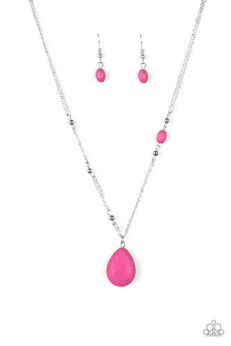 Dotted with shimmery silver beads and a dainty pink stone, shimmery silver chains give way to a vivacious pink teardrop pendant below the collar for a seasonal look. Features an adjustable clasp closure.  Sold as one individual necklace. Includes one pair of matching earrings.