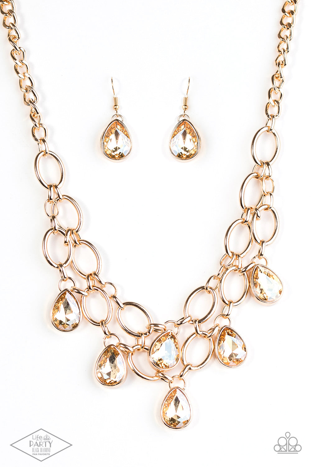 Joined by dainty gold links, two rows of dramatic gold chain layer below the collar in a fierce fashion. Golden teardrops drip from the glistening layers, adding a timeless shimmer to the show-stopping piece.  Features an adjustable clasp closure. 