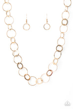 Load image into Gallery viewer, Dainty gold hoops and rings delicately link into a chic chain, creating simplistic shimmer below the collar. Features an adjustable clasp closure.
