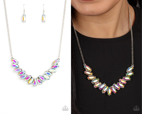 Featuring pronged silver fittings, a sparkly series of iridescent marquise cut rhinestones fan out below the collar for a stellar statement-making look. Features an adjustable clasp closure.