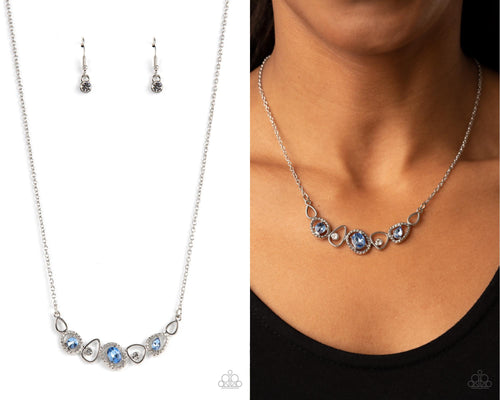An incandescent assortment of shiny silver frames, dainty white rhinestones, and oversized blue gems delicately coalesce into a statement-making sparkle below the collar. Features an adjustable clasp closure.  Sold as one individual necklace. Includes one pair of matching earrings.