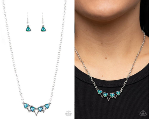 A staggered row of iridescent triangular gems stack across the front of a row of textured silver triangular frames, resulting in a stellar sparkle below the collar. Features an adjustable clasp closure.  Sold as one individual necklace. Includes one pair of matching earrings.