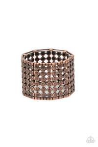 Bordered by rows of copper cubes, stacked rows of antiqued copper dots connect into rectangular frames that are threaded along stretchy bands around the wrist for an edgy geometric finish.  Sold as one individual bracelet