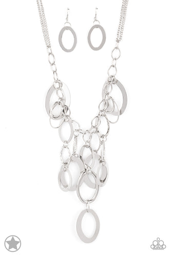  Large silver links and shimmering textured silver rings cascade below a silver chain freely, allowing for movement that makes a bold statement. Features an adjustable clasp closure.