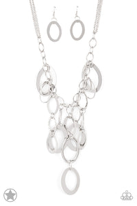  Large silver links and shimmering textured silver rings cascade below a silver chain freely, allowing for movement that makes a bold statement. Features an adjustable clasp closure.